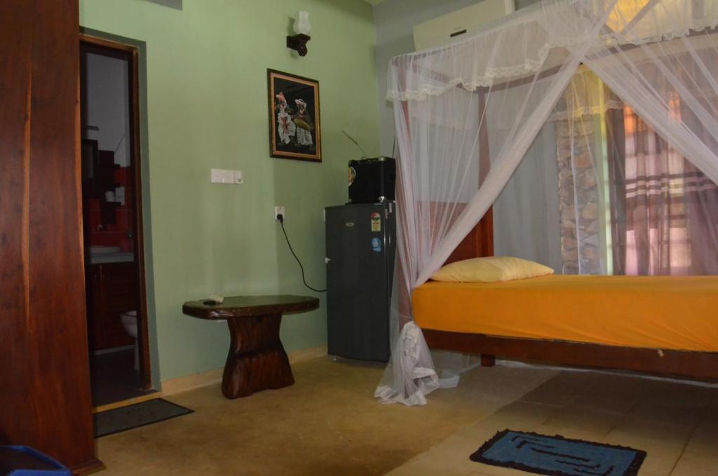 Time N Tide Beach Resort Hikkaduwa Pokoj fotografie